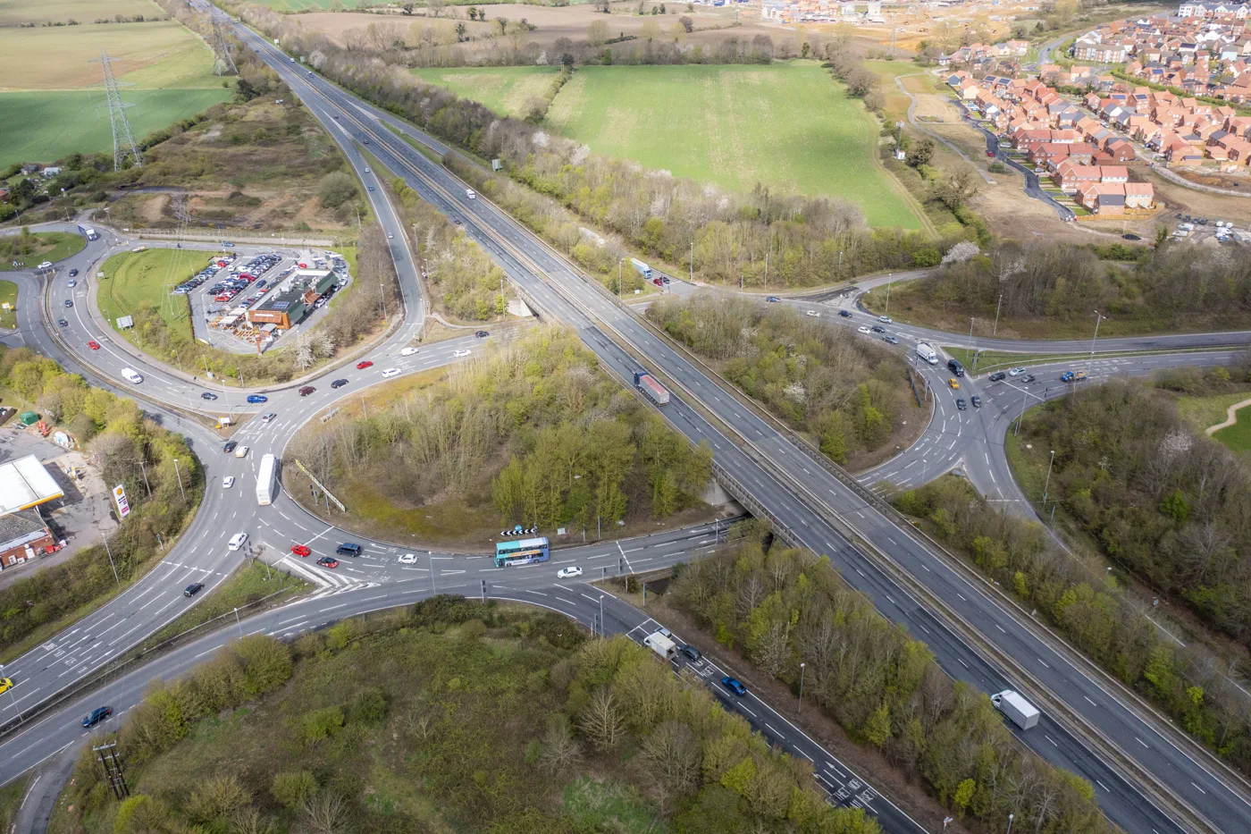 Thickthorn Interchange, where the A47 meets the A11 on the south-western edge of Norwich, photographed from the air in April 2024, before the new bridge went in