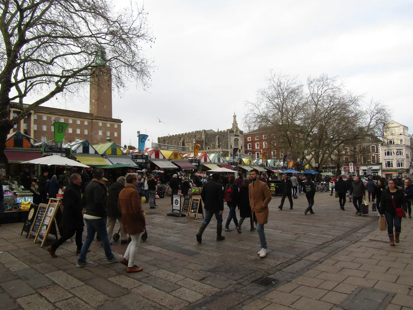 Norwich Market and the Market Place, with City Hall's clock tower behind. The photo is a general view of the city centre, not of any business named in this story